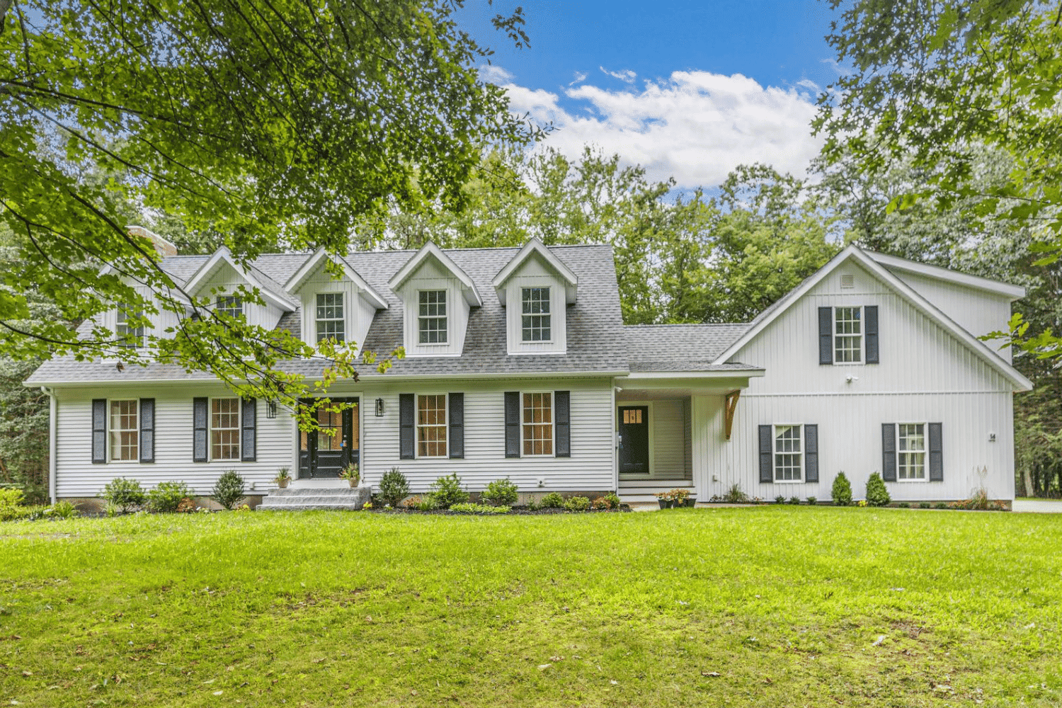 house-with-flowers Scaled home building services